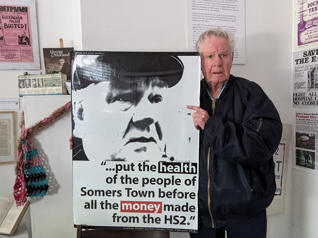 David Hoefling, with a poster he features in